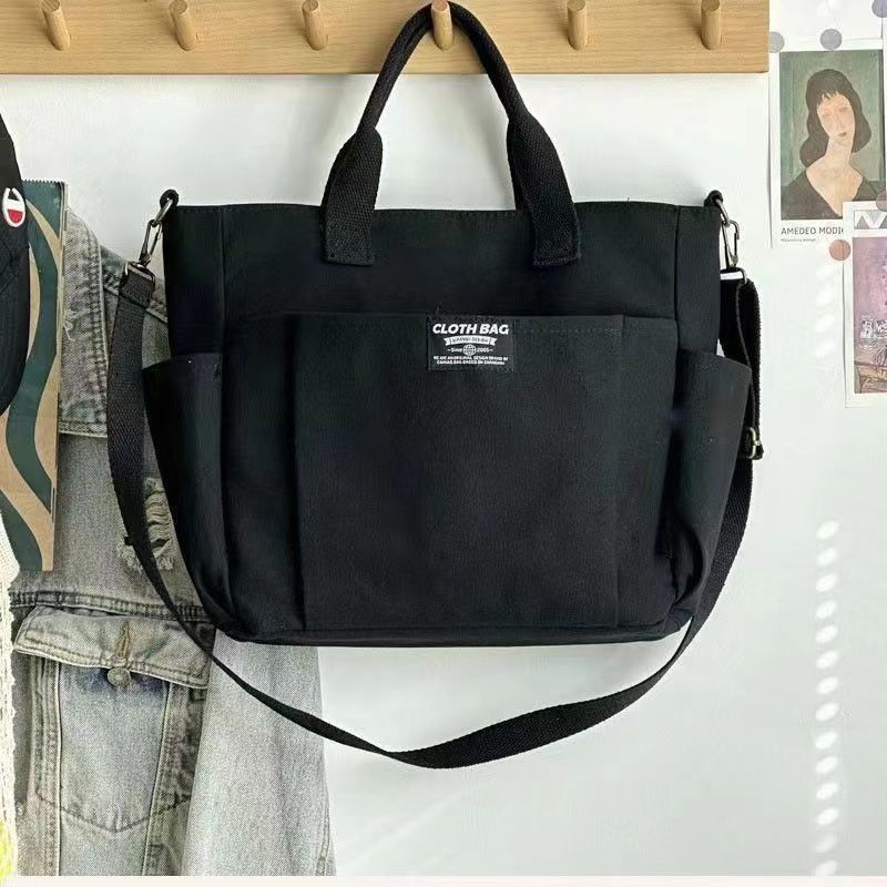 Large Capacity Canvas Shoulder Bag for Daily Commuting and Travel Use Bag