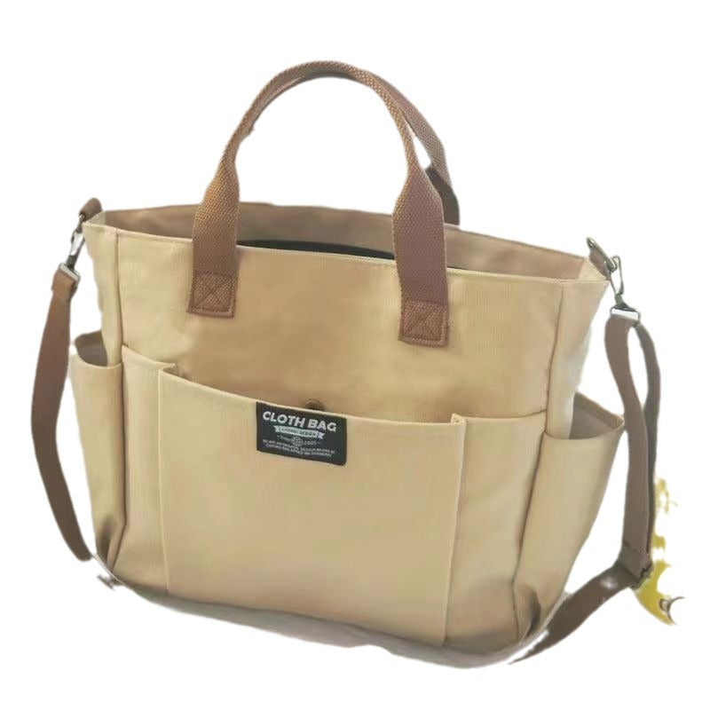 Large Capacity Canvas Shoulder Bag for Daily Commuting and Travel Use Bag