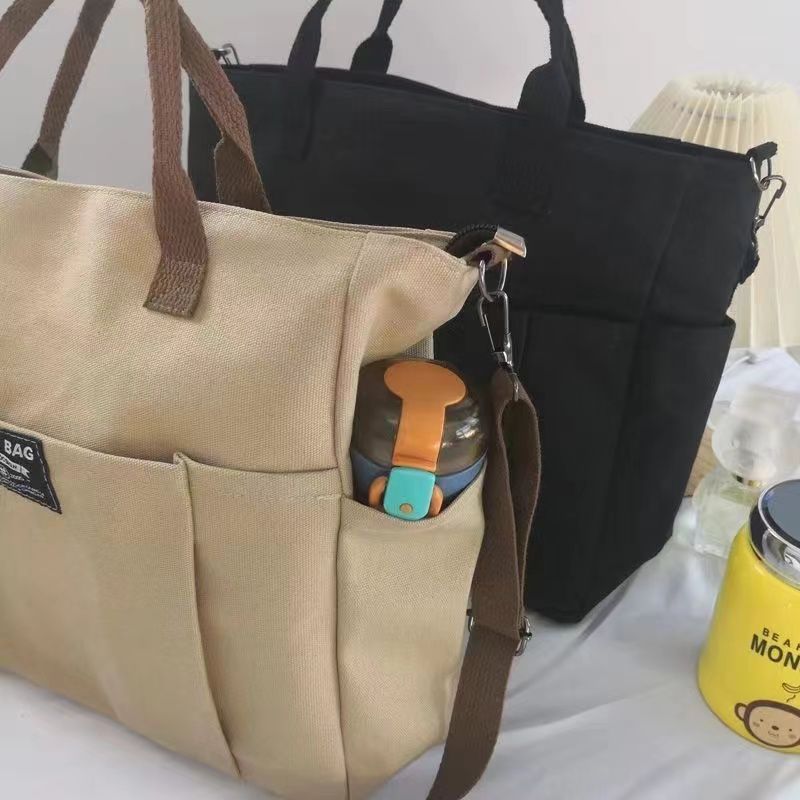 Large Capacity Canvas Shoulder Bag for Daily Commuting and Travel Use Bag
