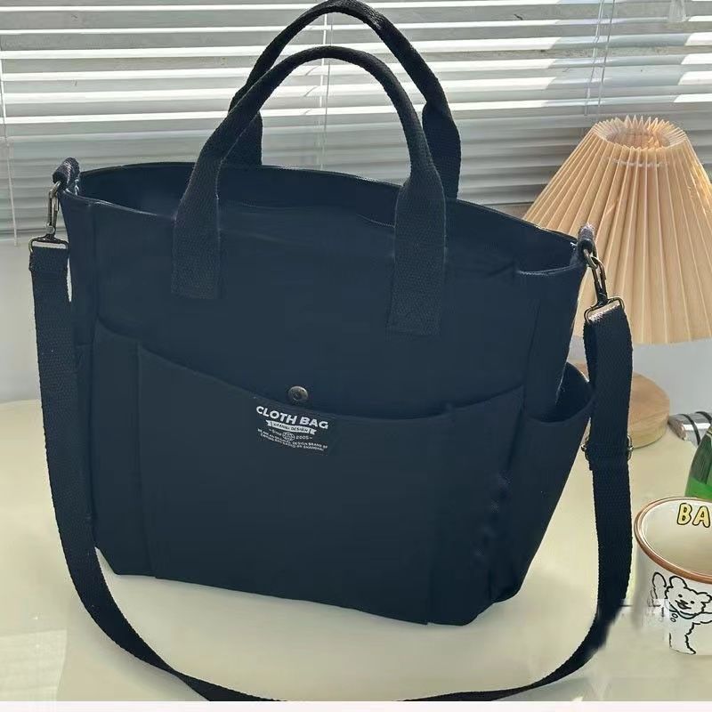 Large Capacity Canvas Shoulder Bag for Daily Commuting and Travel Use Bag