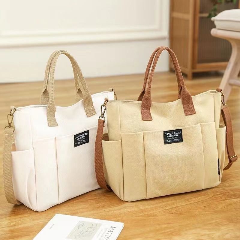 Large Capacity Canvas Shoulder Bag for Daily Commuting and Travel Use Bag