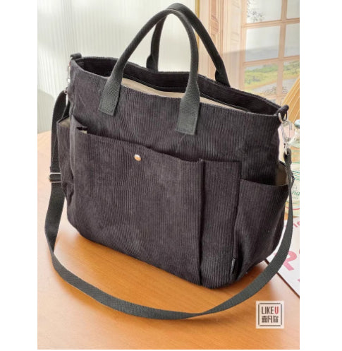 Large Capacity Canvas Shoulder Bag for Daily Commuting and Travel Use Bag